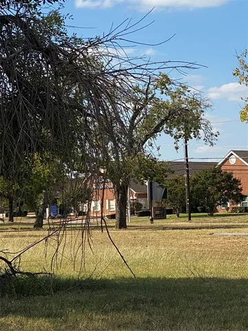 a view of yard with patio