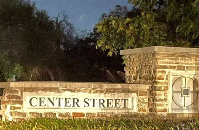 a view of a sign under an umbrella