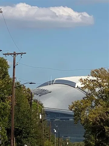 a view of roof deck with a yard