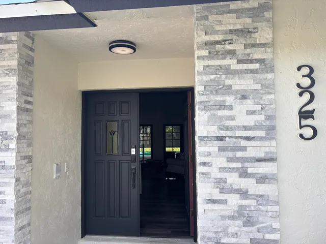 a view of a livingroom with furniture