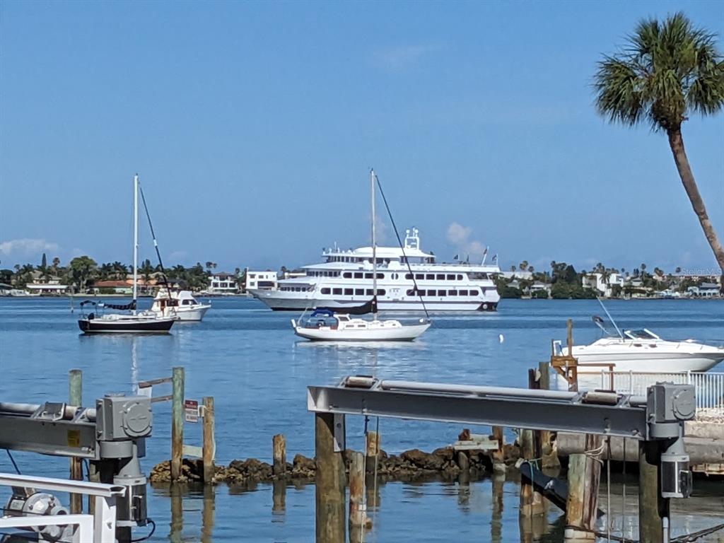 668 American Legion Drive Madeira Beach, FL 33708 - Photo 16 of 49 a view of a chairs and table in center