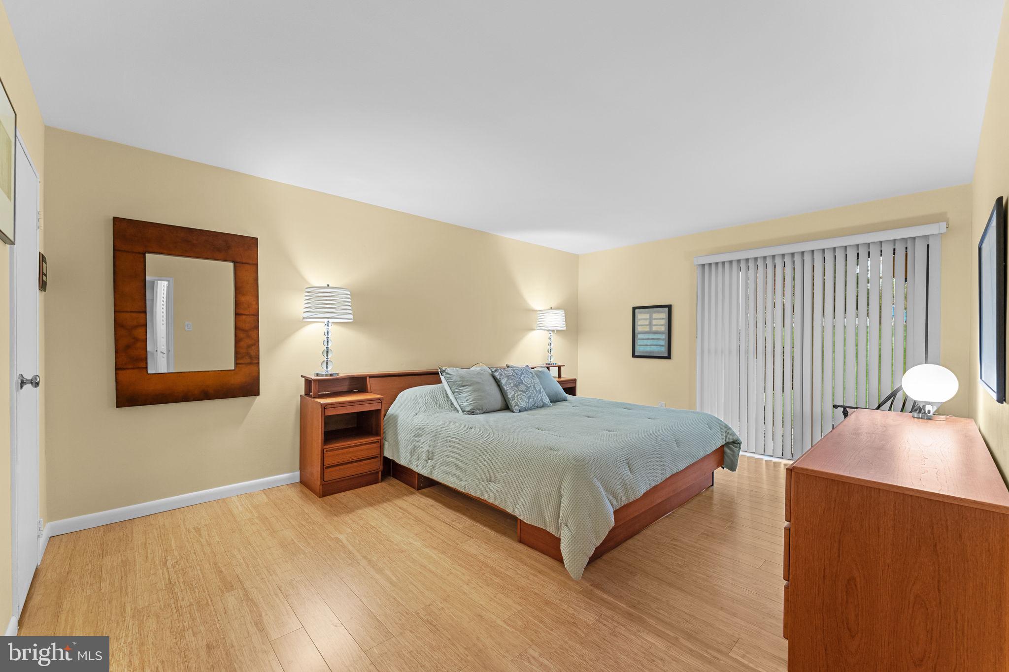 1704 Raintree Lane Malvern, PA 19355 - Photo 13 of 28 Primary bedroom with sliding glass to 2nd deck