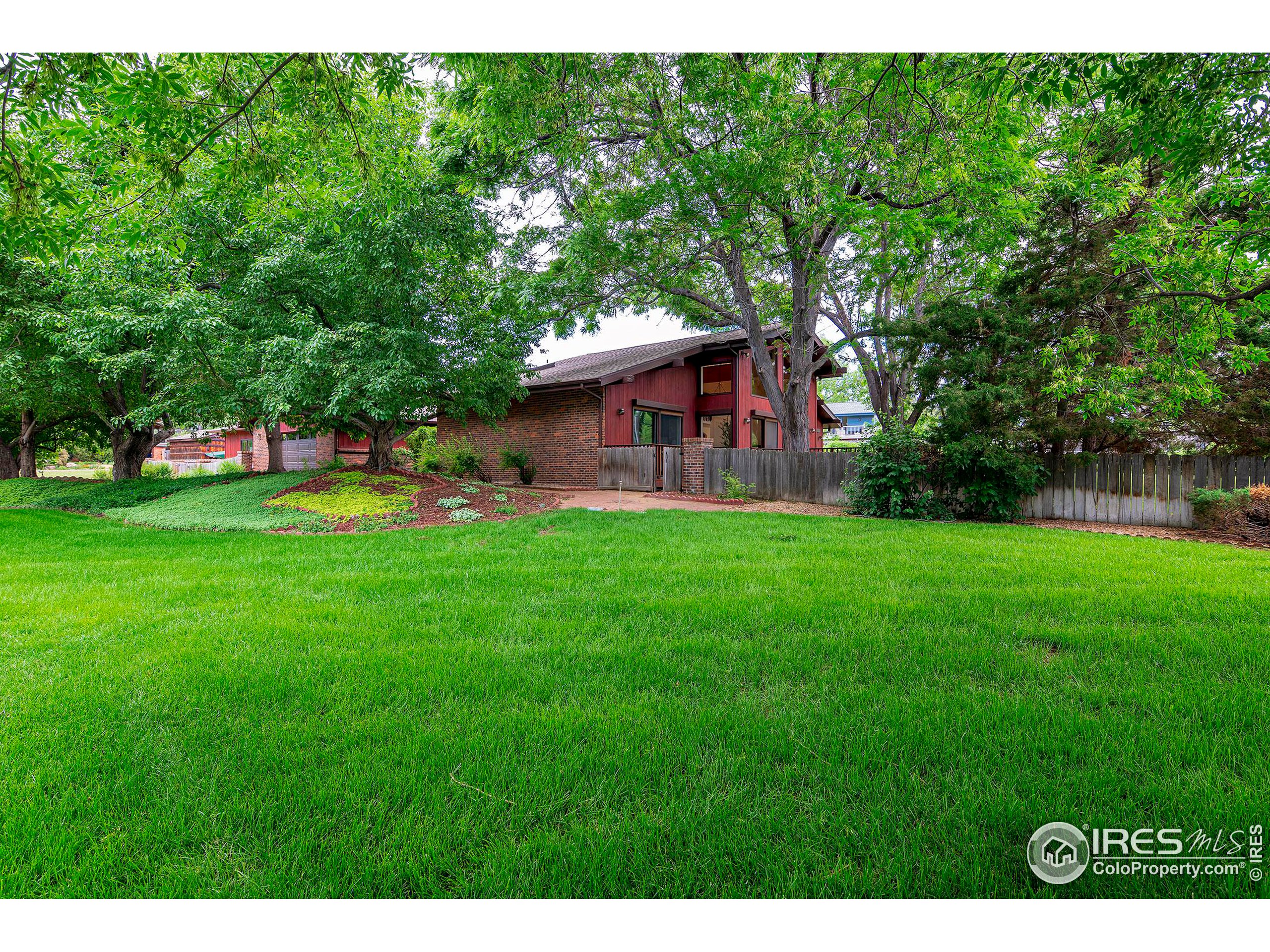 7700 O Connor Road Boulder, CO 80303 - Photo 2 of 40 a view of a house with a yard porch and sitting area