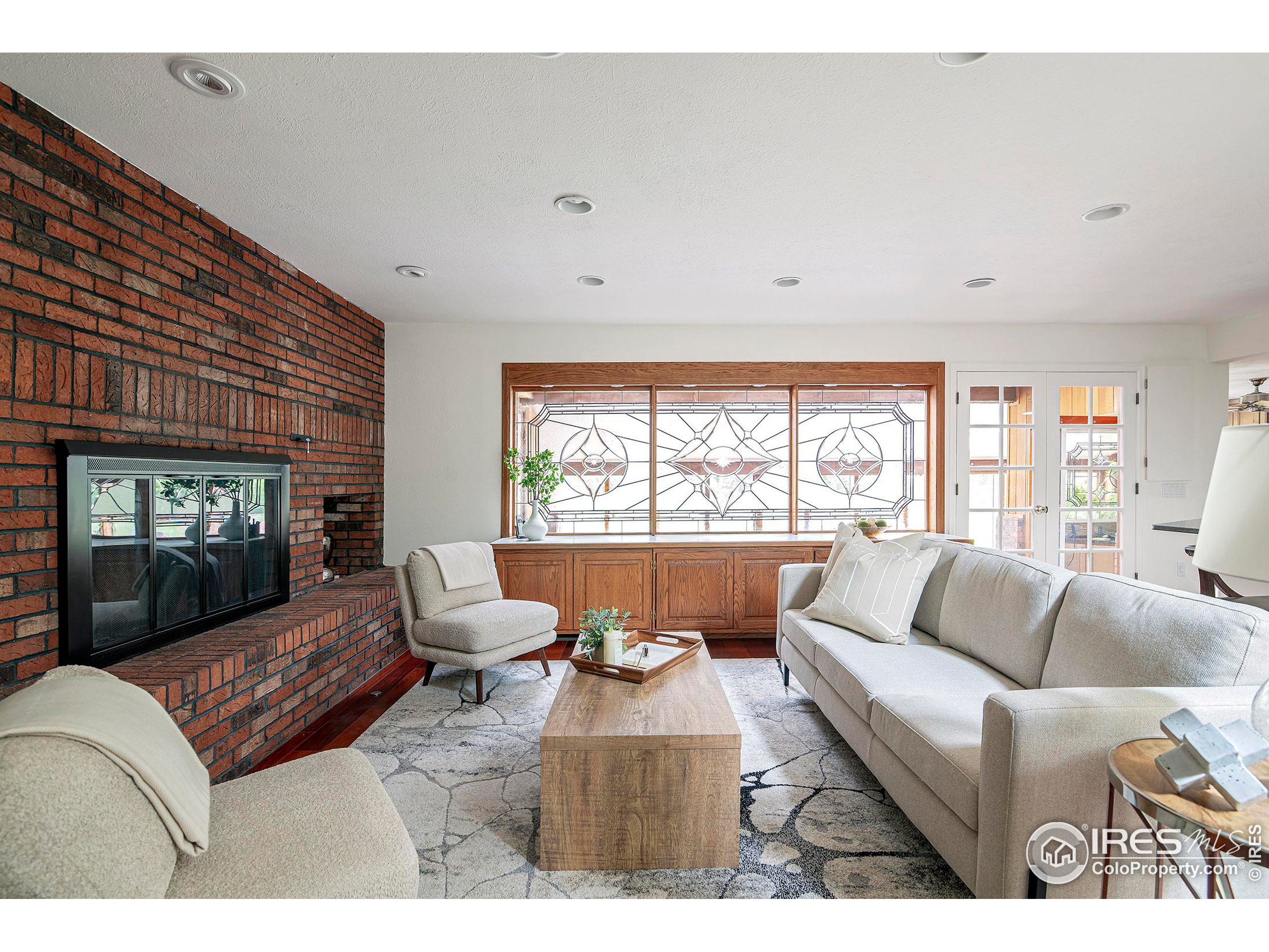 7700 O Connor Road Boulder, CO 80303 - Photo 23 of 40 a living room with furniture and a large window