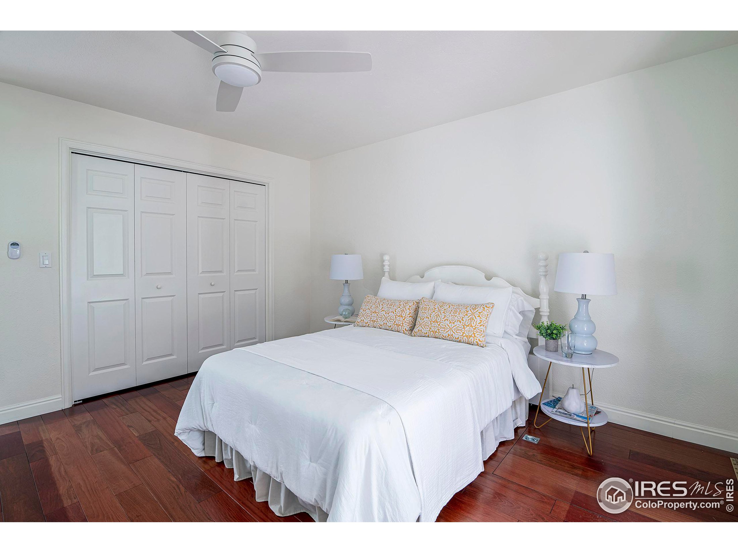 7700 O Connor Road Boulder, CO 80303 - Photo 30 of 40 a bedroom with a bed and a table