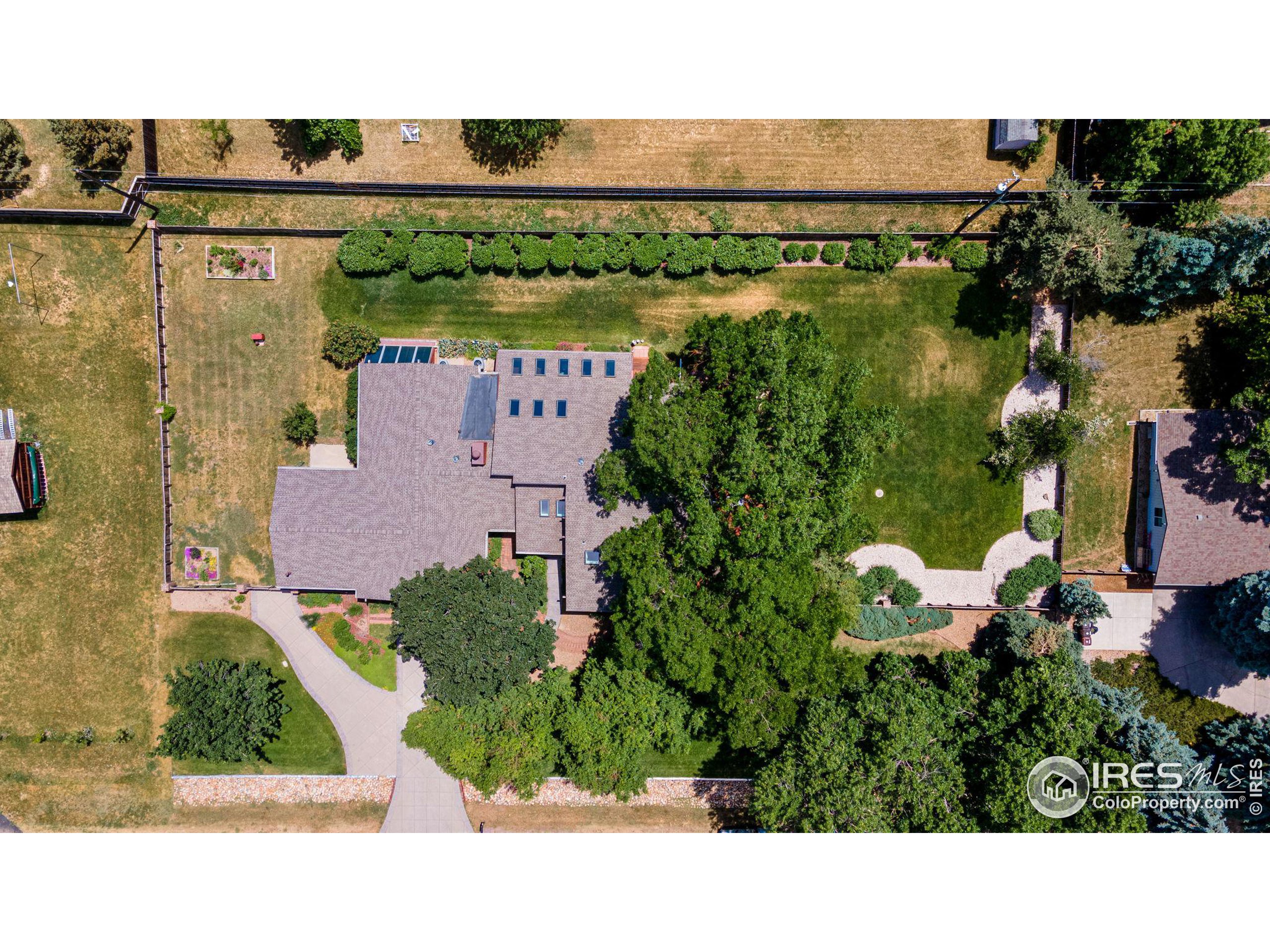 7700 O Connor Road Boulder, CO 80303 - Photo 39 of 40 an aerial view of a house with a lake view