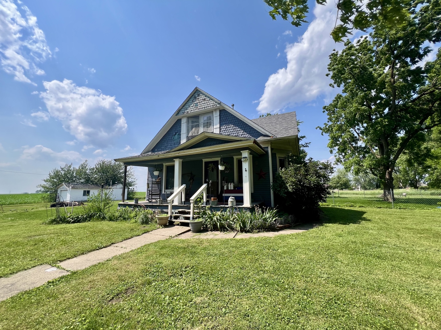 207 2nd Street Broadlands, IL 61816 - Photo 1 of 45 a front view of a house with garden