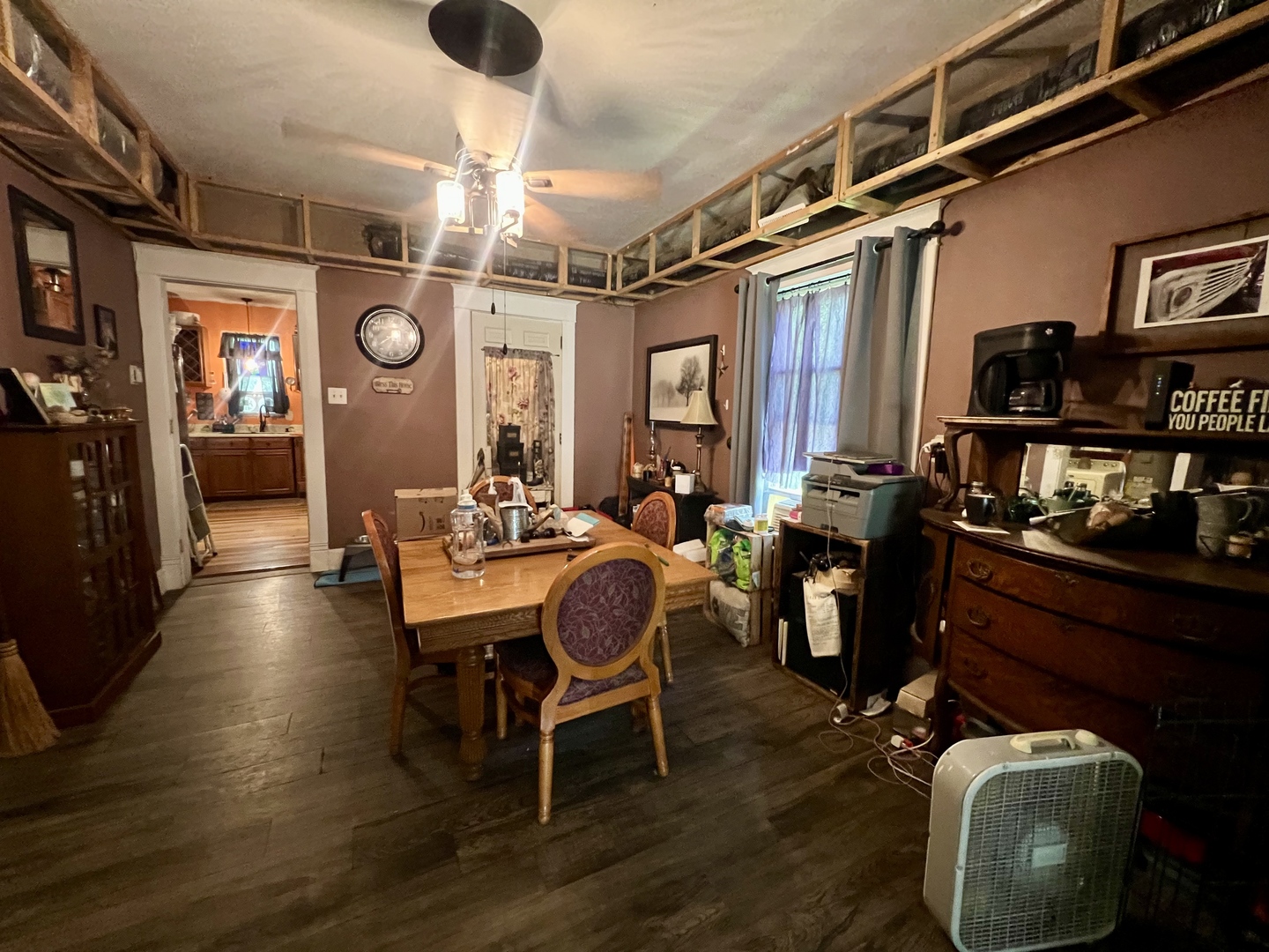 207 2nd Street Broadlands, IL 61816 - Photo 14 of 45 a living room with couches a dining table and chairs with wooden floor