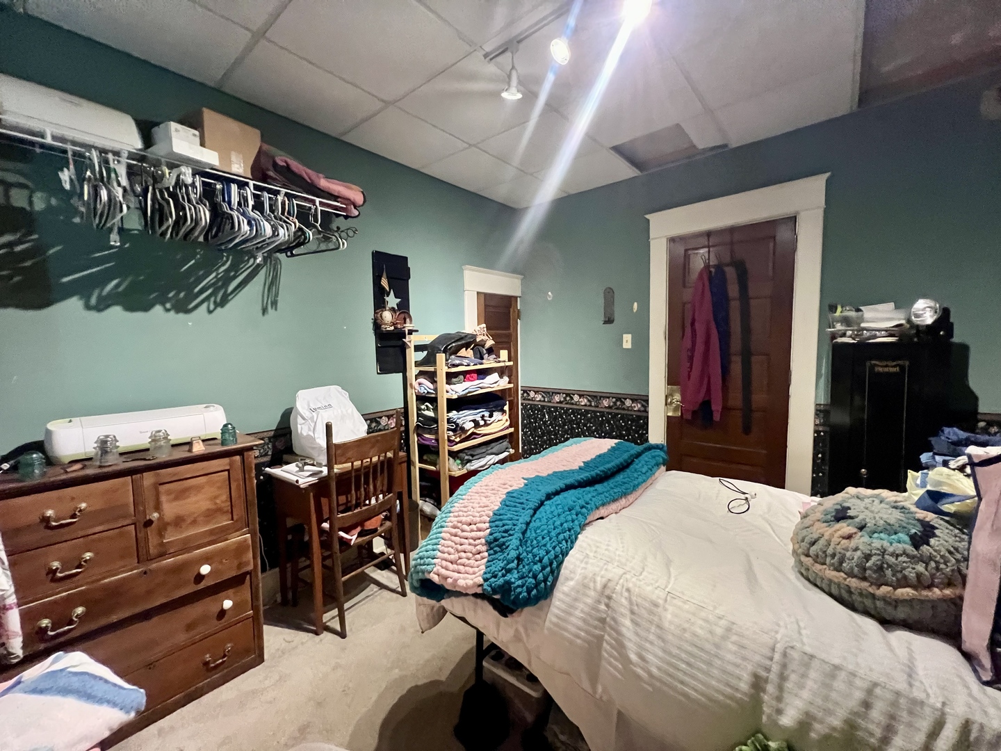 207 2nd Street Broadlands, IL 61816 - Photo 22 of 45 a bedroom with a bed and dresser with mirror