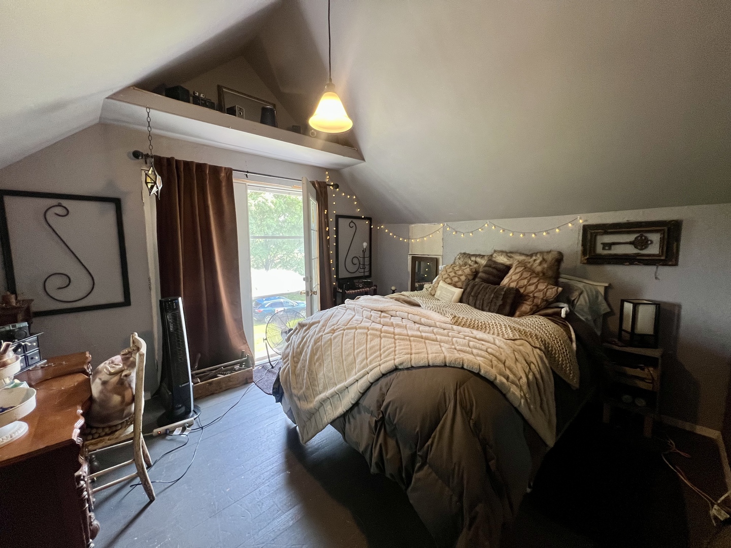 207 2nd Street Broadlands, IL 61816 - Photo 24 of 45 a bed sitting in a bedroom next to a window