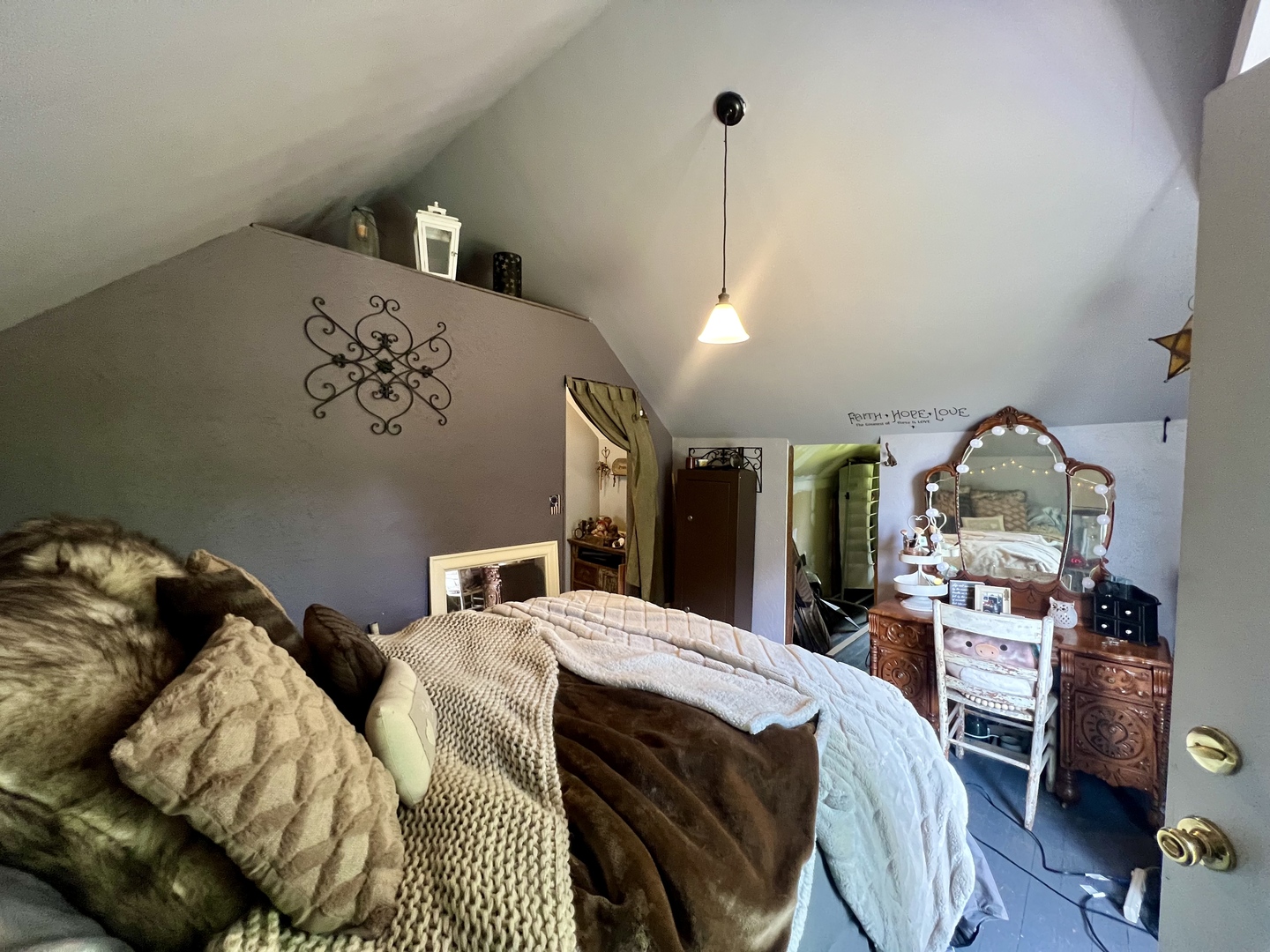 207 2nd Street Broadlands, IL 61816 - Photo 26 of 45 a view of a bedroom with furniture and chandelier