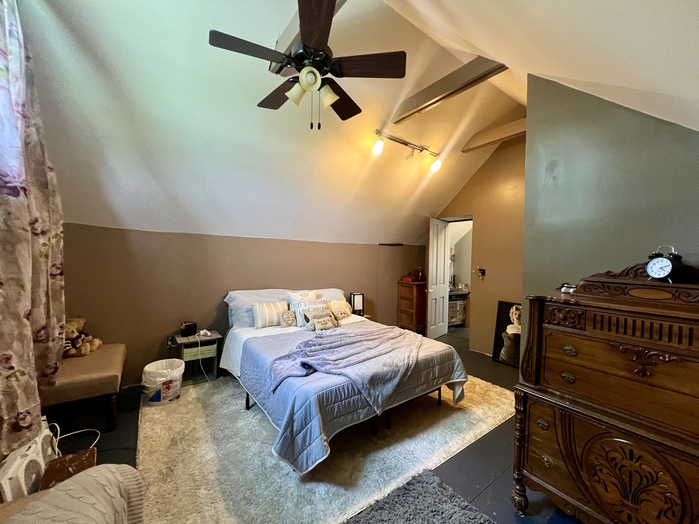 207 2nd Street Broadlands, IL 61816 - Photo 28 of 45 a bedroom with a bed and wooden floor