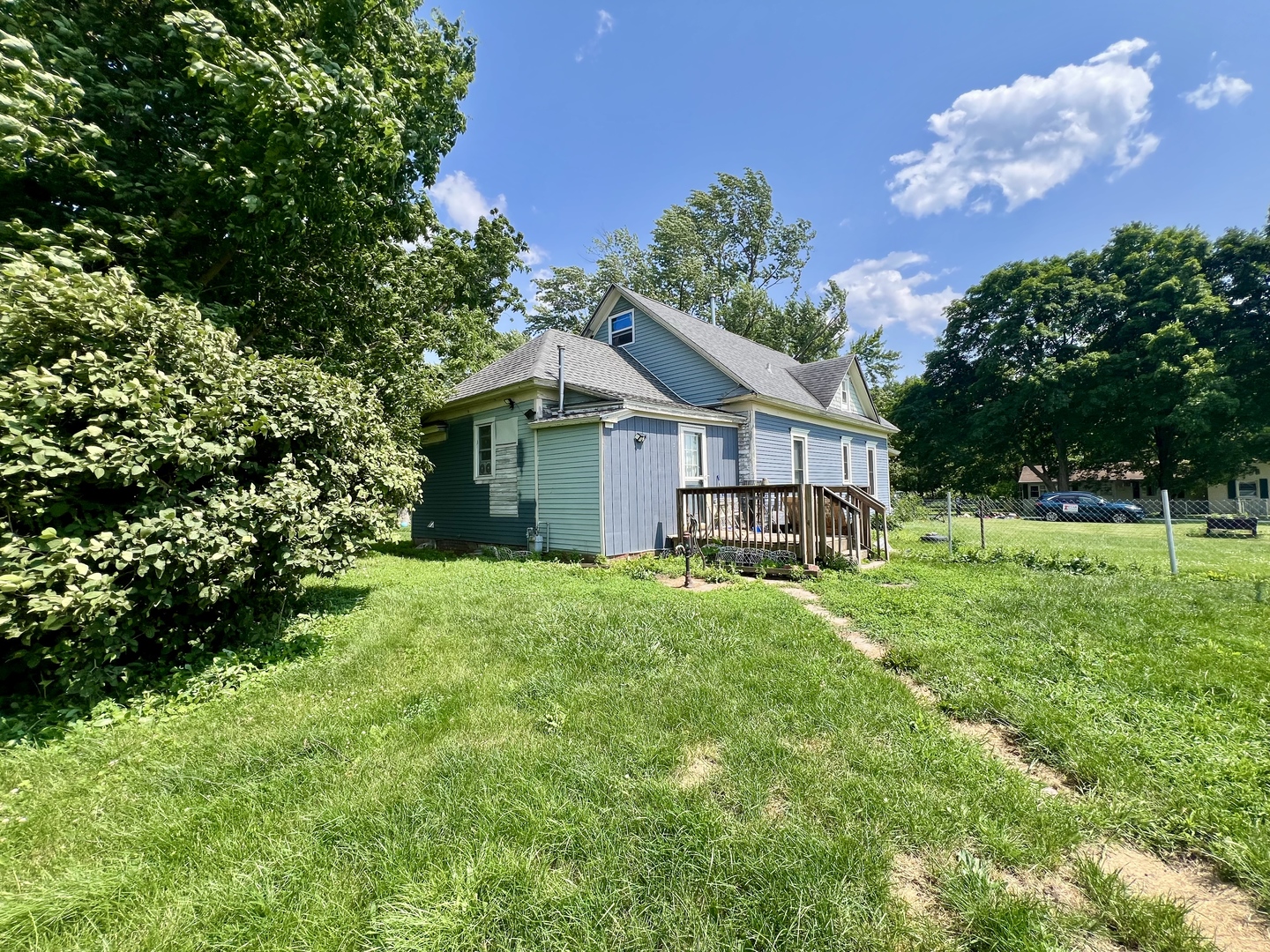 207 2nd Street Broadlands, IL 61816 - Photo 41 of 45 a house view with a garden space