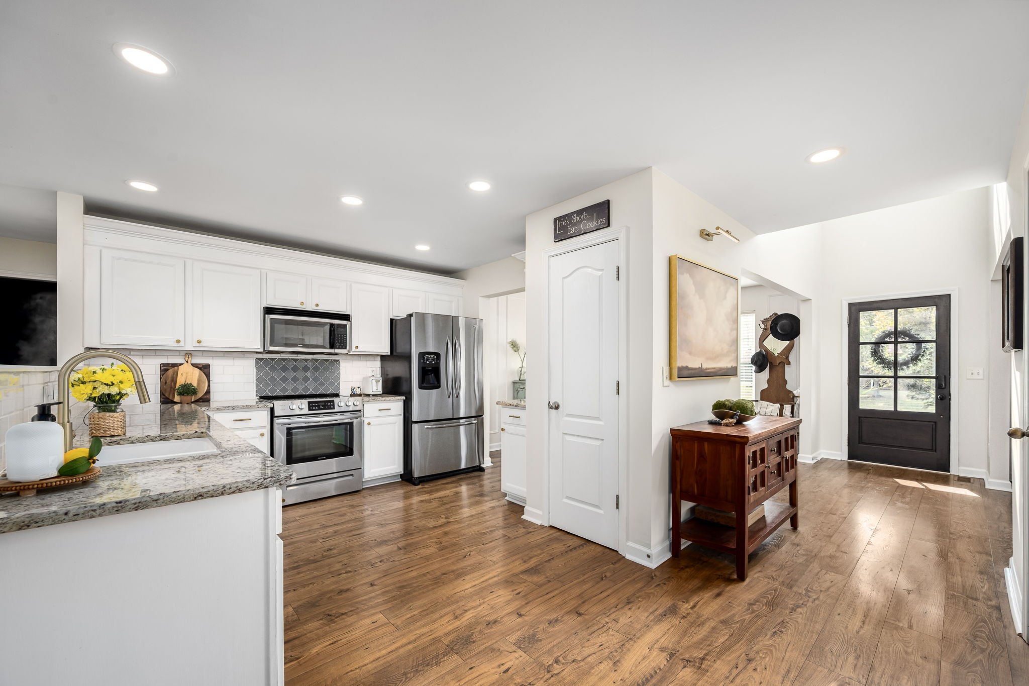 201 Nashua Court Murfreesboro, TN 37128 - Photo 17 of 79 a kitchen with stainless steel appliances a refrigerator and a stove top oven