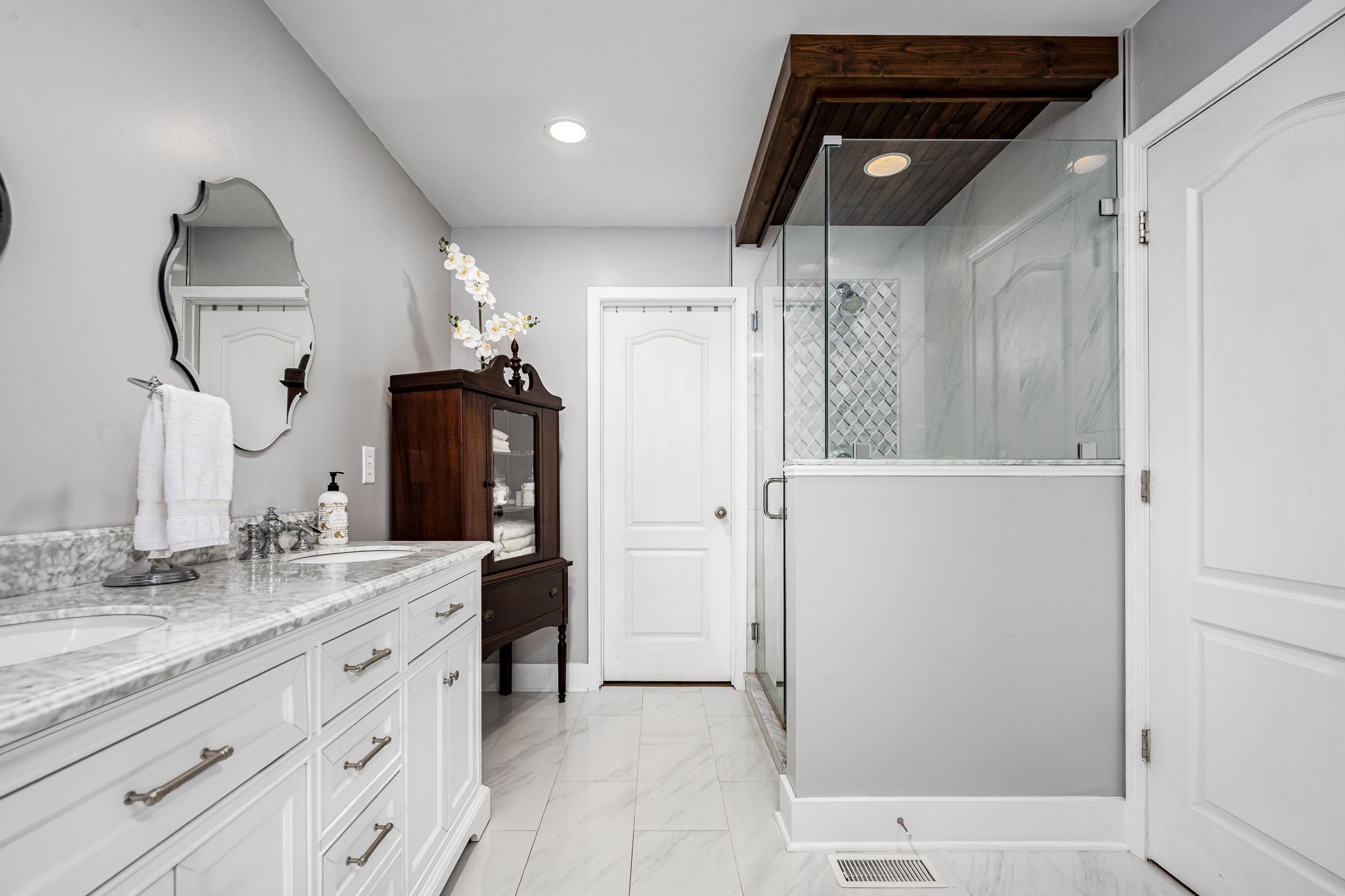 201 Nashua Court Murfreesboro, TN 37128 - Photo 33 of 79 a bathroom with a double vanity sink mirror and shower