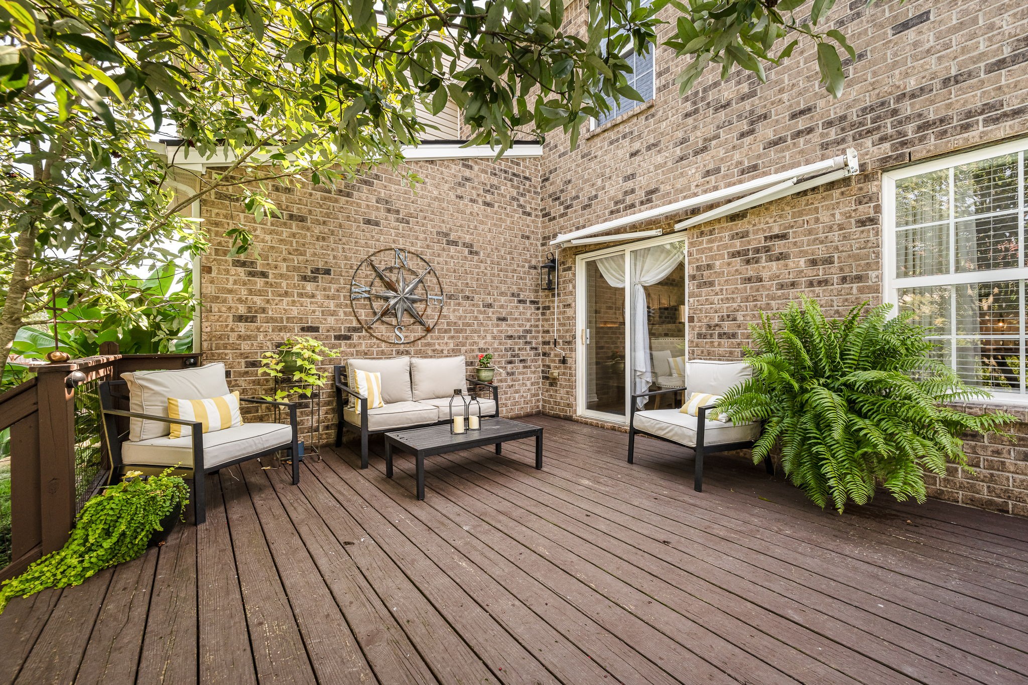 201 Nashua Court Murfreesboro, TN 37128 - Photo 50 of 79 a balcony with wooden floor and outdoor seating