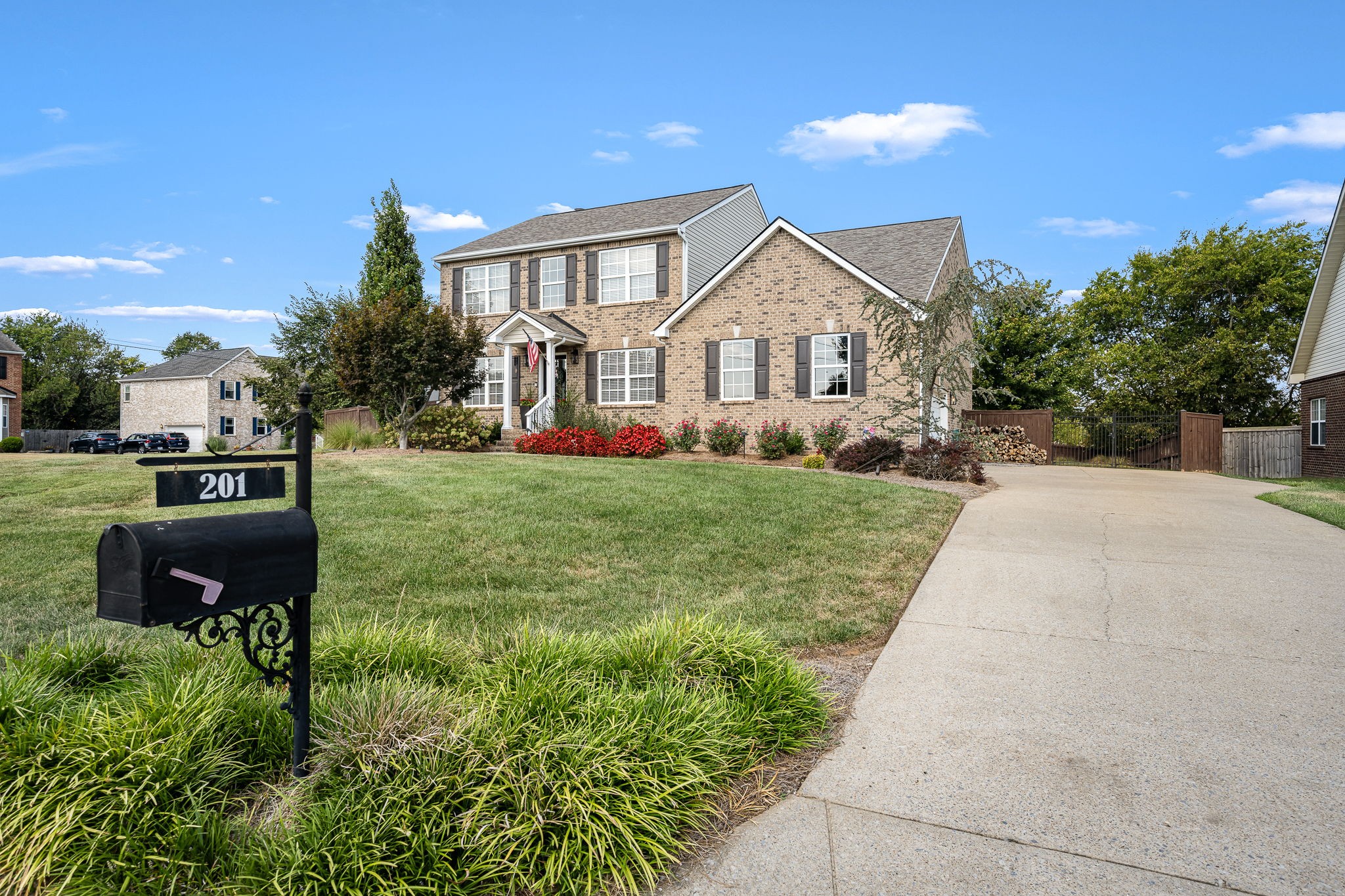 201 Nashua Court Murfreesboro, TN 37128 - Photo 5 of 79 a view of a house with a yard and sitting area