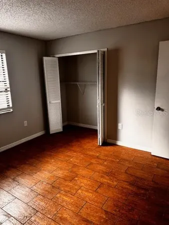 an empty room with closet