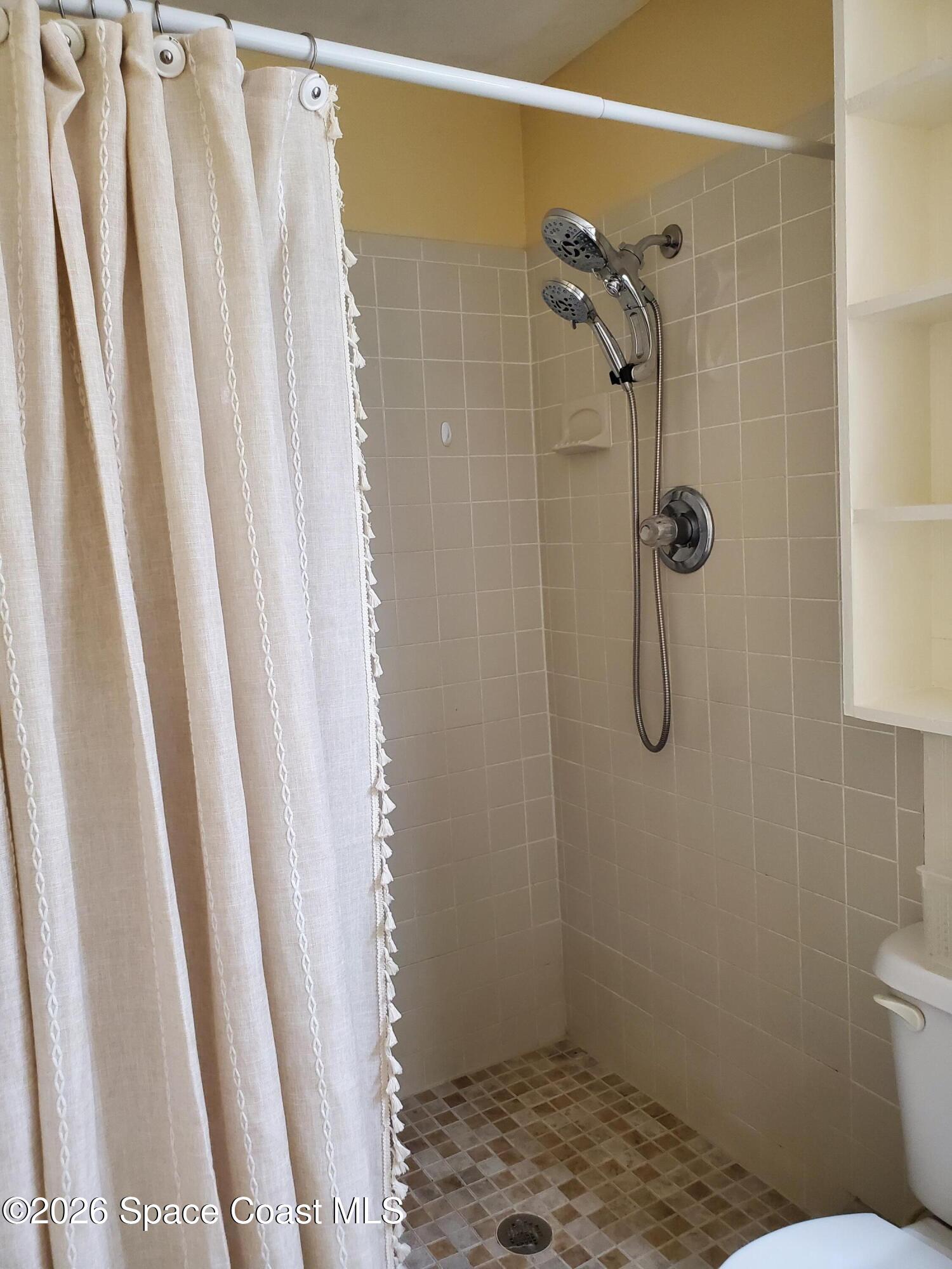2324 Bignonia Street, Unit 2 Melbourne, FL 32901 - Photo 14 of 19 a bathroom with a shower