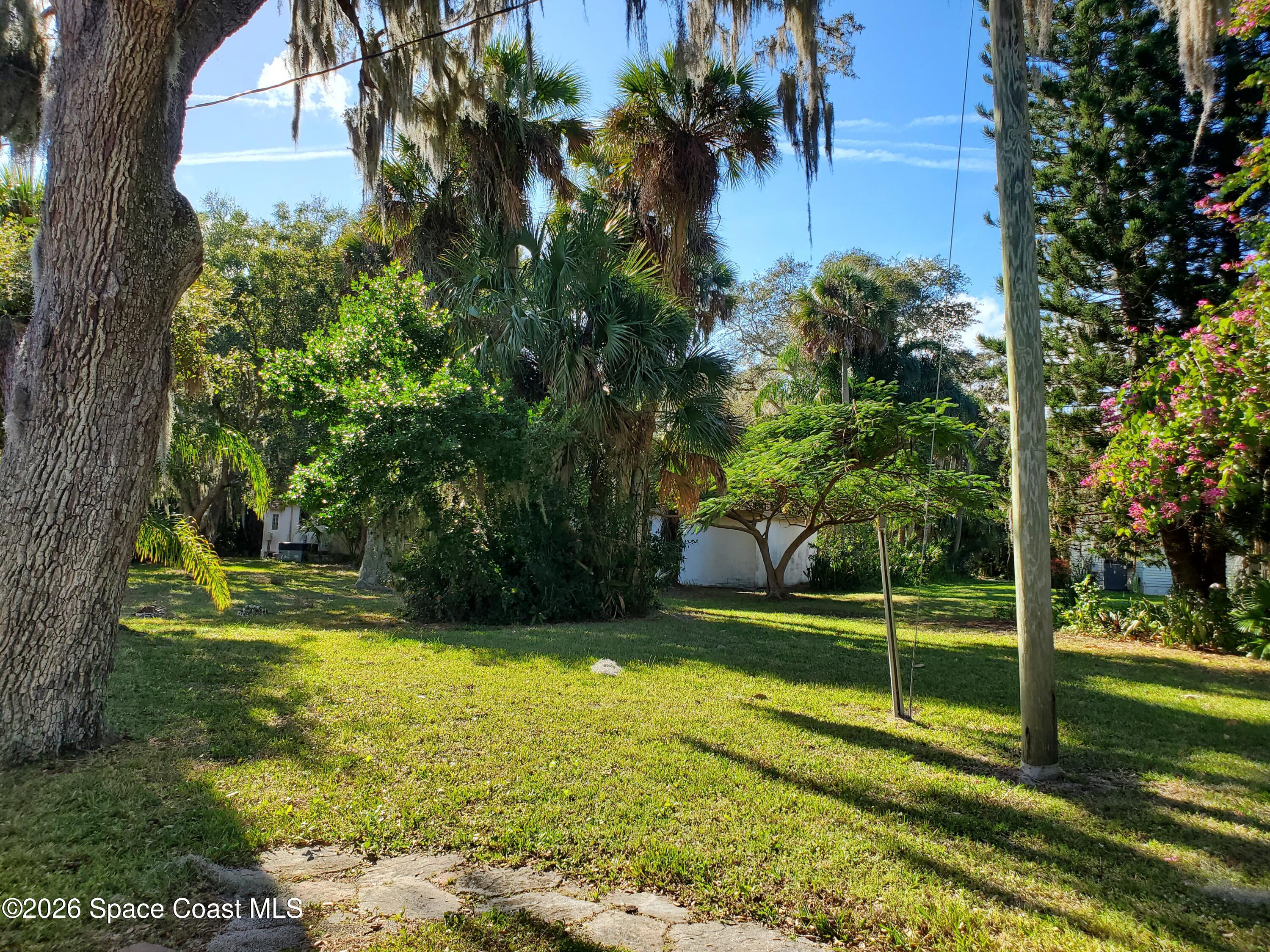 2324 Bignonia Street, Unit 2 Melbourne, FL 32901 - Photo 18 of 19 a view of swimming pool with yard