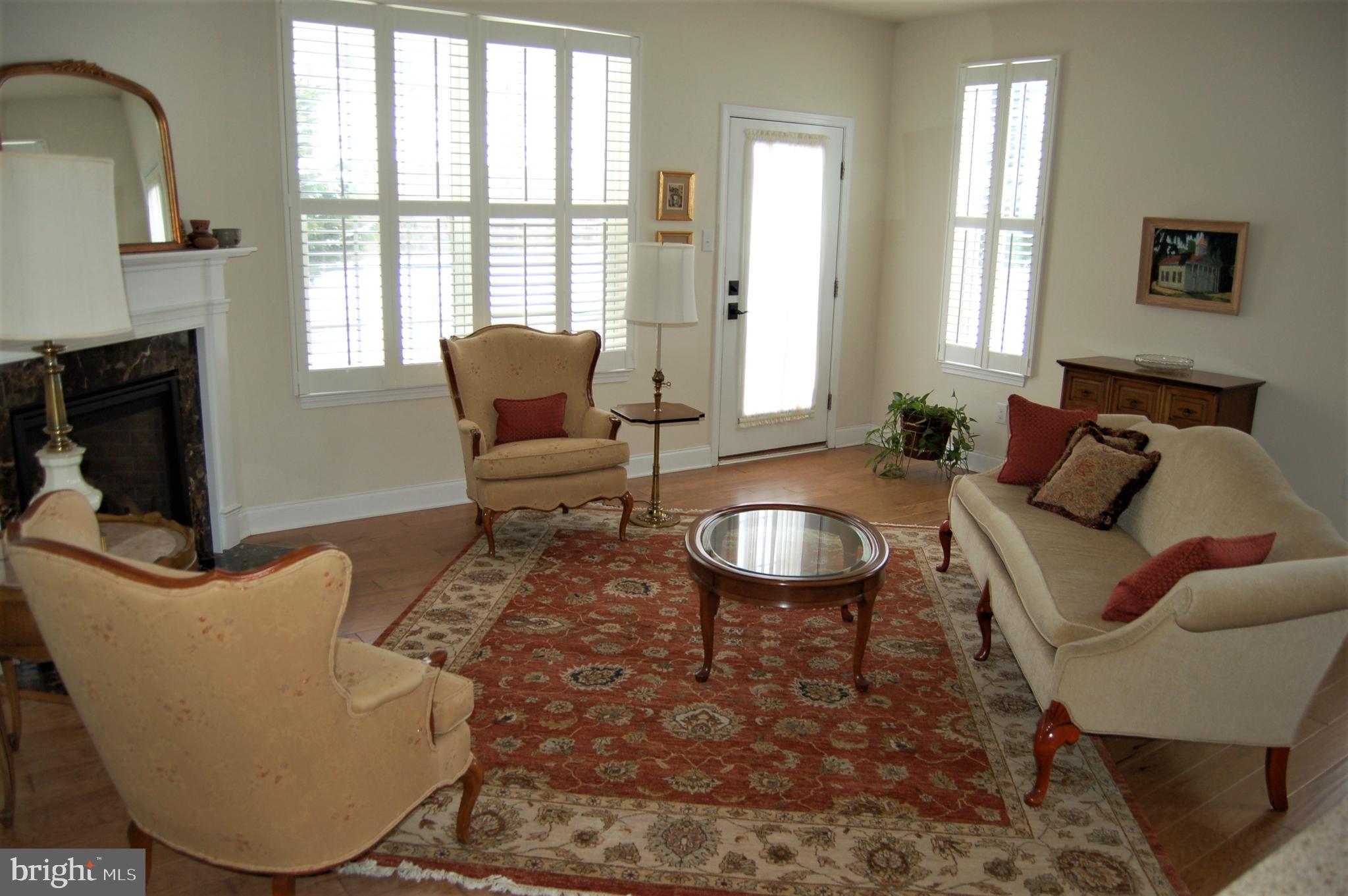 185 Pinkerton Road Coatesville, PA 19320 - Photo 5 of 17 Living room with door to covered patio