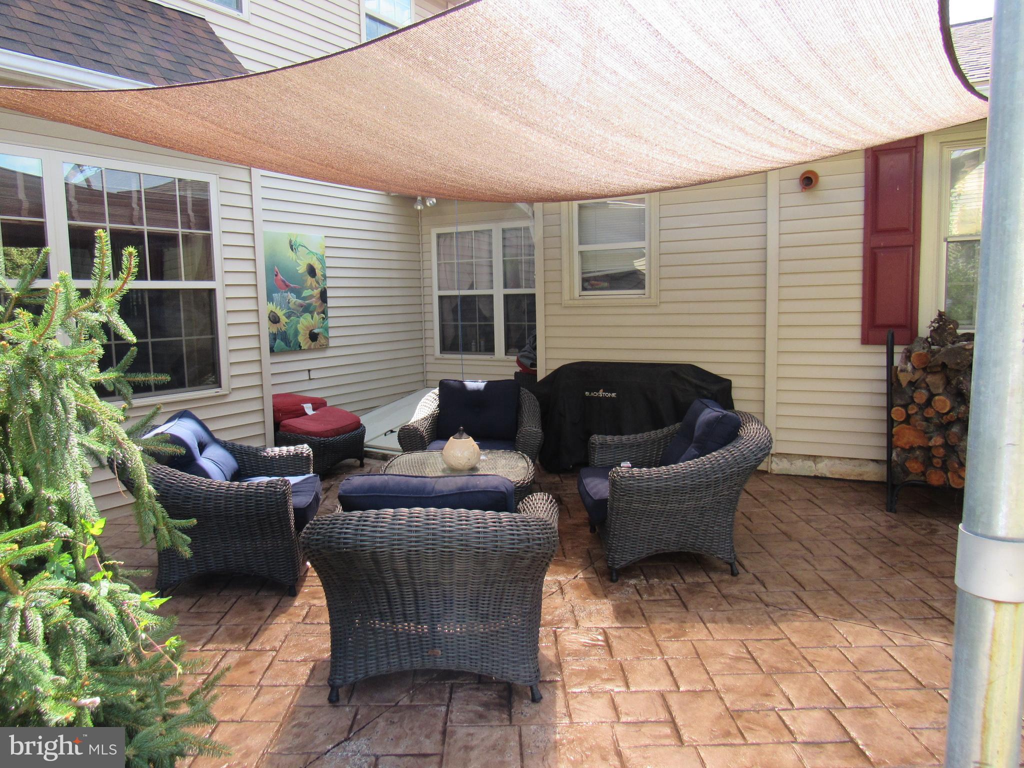 1105 Wilson Street Pottstown, PA 19464 - Photo 13 of 86 a building outdoor space with patio furniture and potted plants