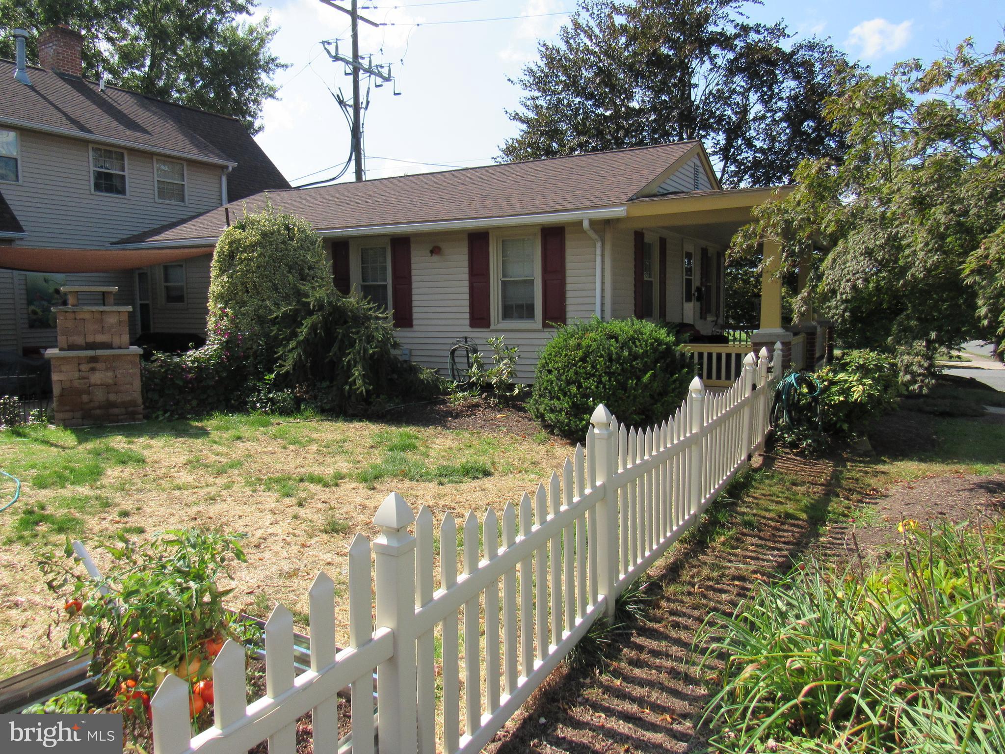 1105 Wilson Street Pottstown, PA 19464 - Photo 17 of 86 a view of a house with wooden fence