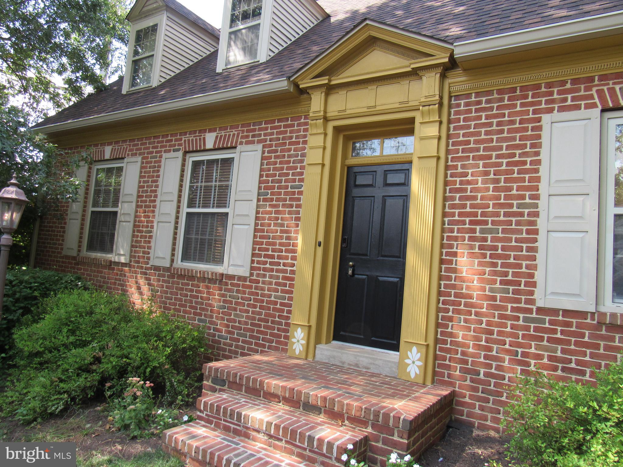 1105 Wilson Street Pottstown, PA 19464 - Photo 4 of 86 a front view of a house with a yard