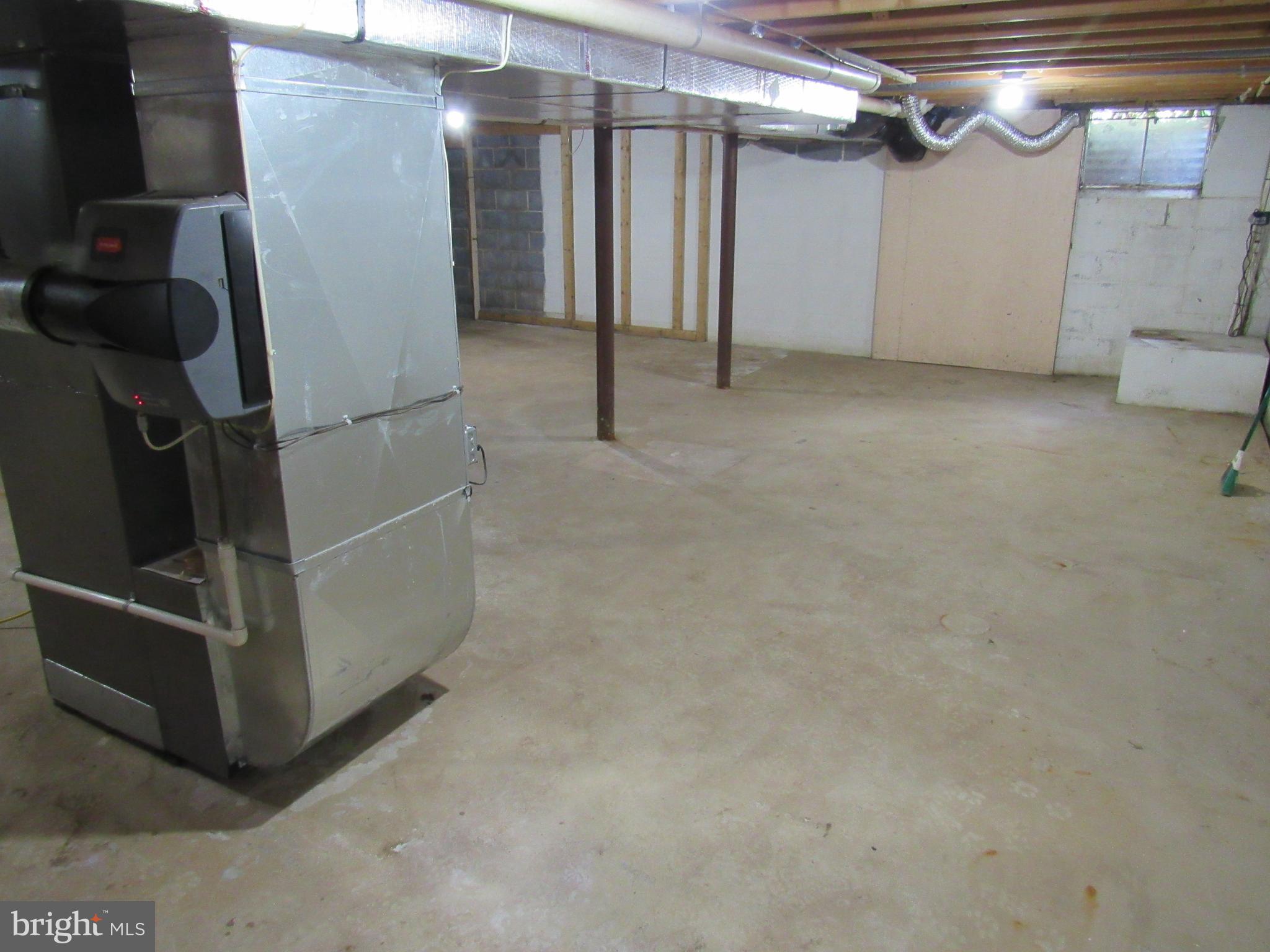 1105 Wilson Street Pottstown, PA 19464 - Photo 51 of 86 MAIN HOUSE FULL BSMT CONCRETE FLOORS