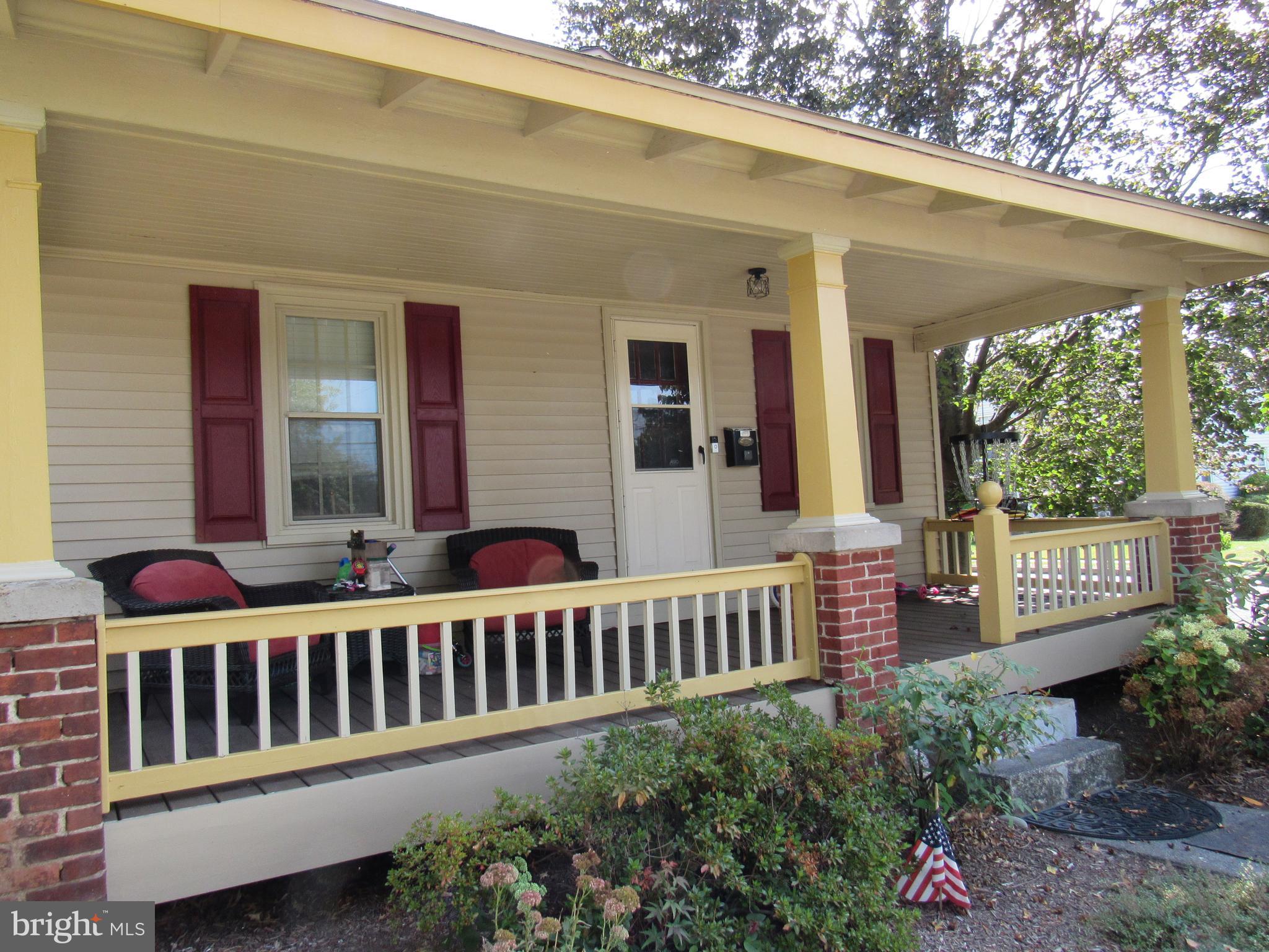 1105 Wilson Street Pottstown, PA 19464 - Photo 61 of 86 a view of a house with porch and wooden floor