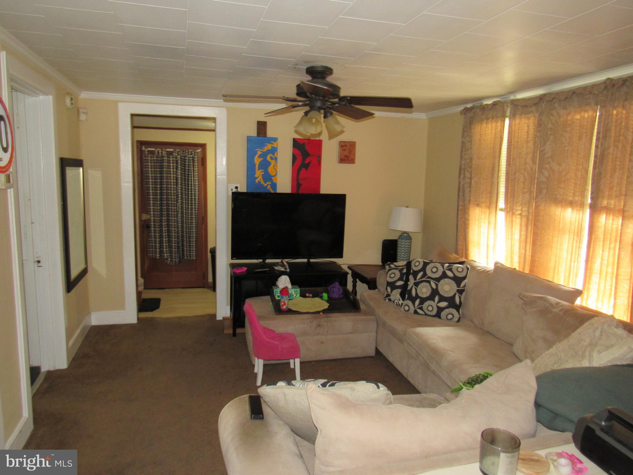 1105 Wilson Street Pottstown, PA 19464 - Photo 74 of 87 a living room with furniture and a flat screen tv