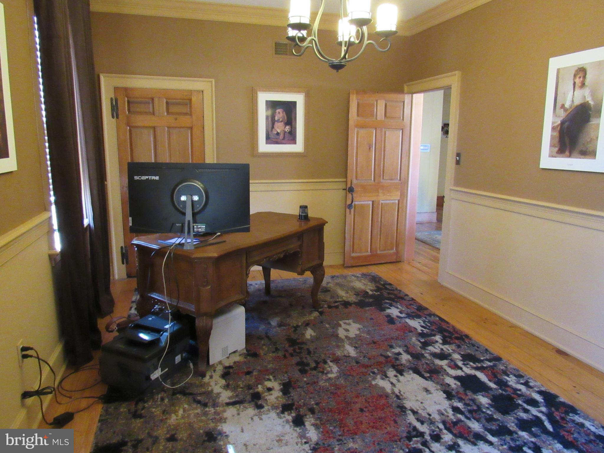 1105 Wilson Street Pottstown, PA 19464 - Photo 76 of 86 a view of a workspace with furniture and chandelier