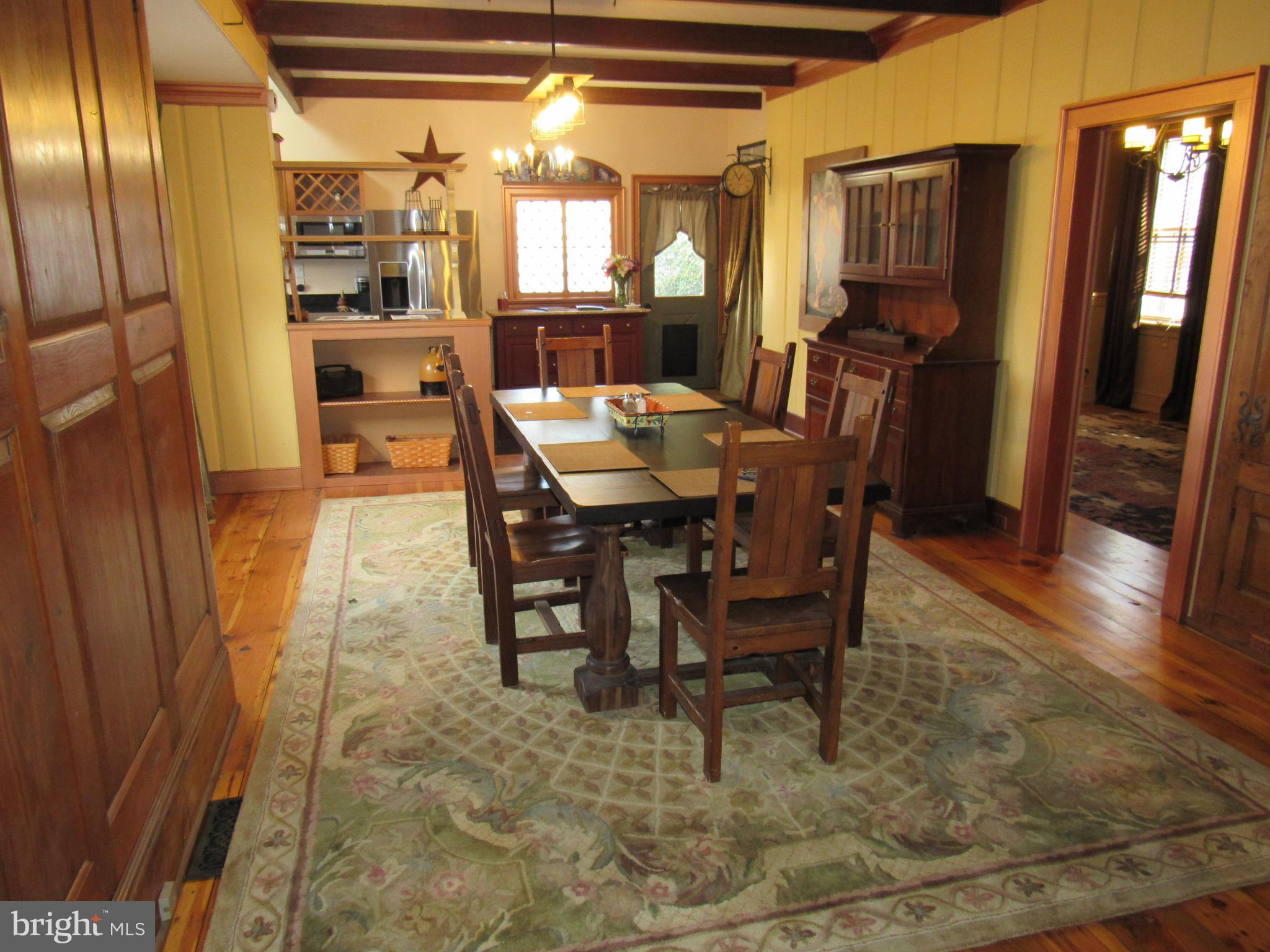 1105 Wilson Street Pottstown, PA 19464 - Photo 81 of 86 a view of a dining room with furniture window and wooden floor