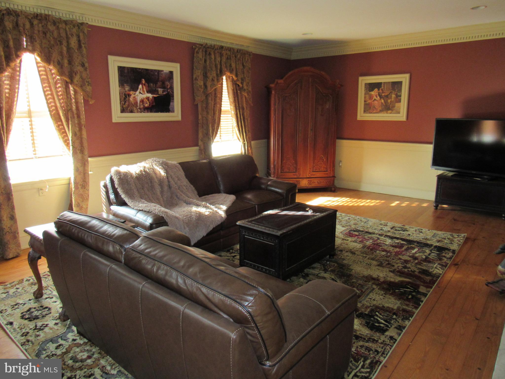 1105 Wilson Street Pottstown, PA 19464 - Photo 84 of 87 a living room with furniture and a flat screen tv