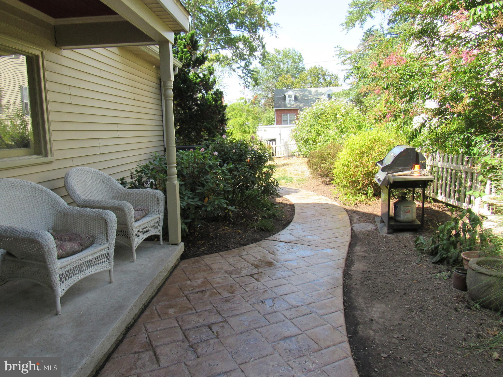1105 Wilson Street Pottstown, PA 19464 - Photo 10 of 86 STAMPED WINDING SIDEWALKS TO SIDE ENTRY TO KIT