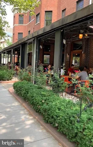 a view of a patio with a table chairs and a patio