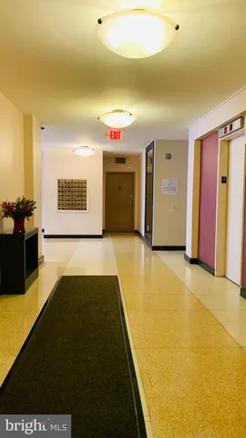 a bed sitting in a bedroom and furniture