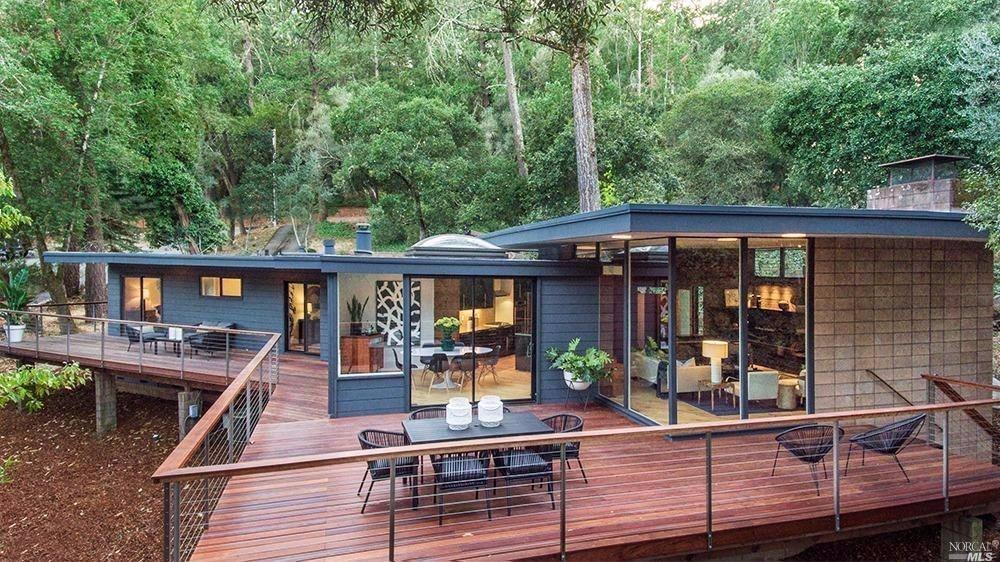 a view of a cafe with a deck