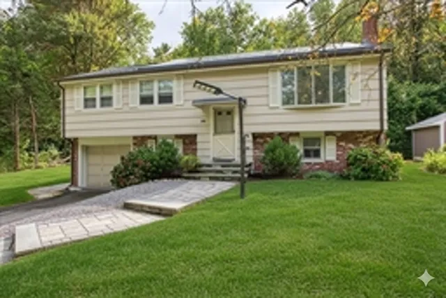 front view of a house with a yard