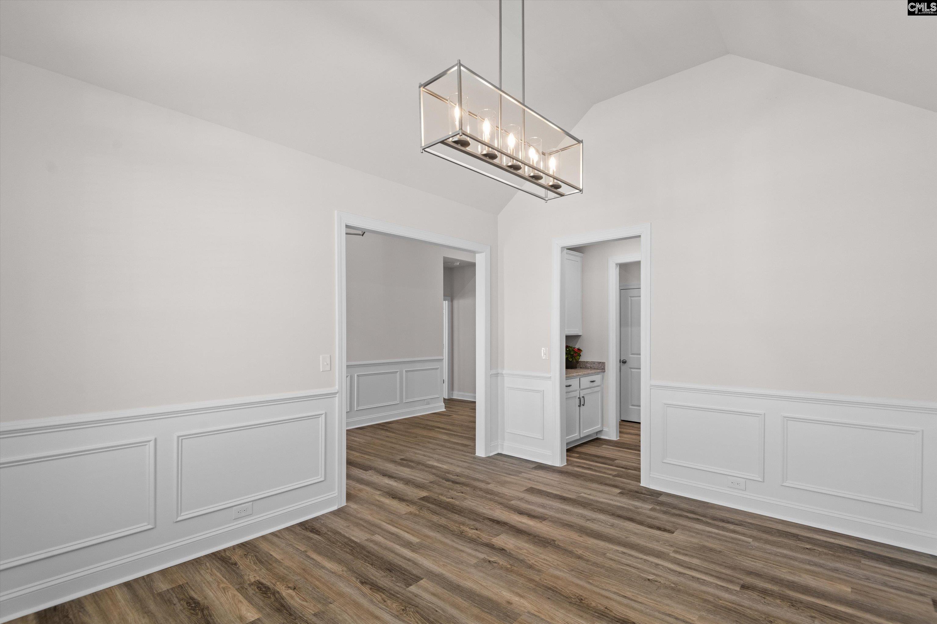 558 Wild Ginger Loop Irmo, SC 29063 - Photo 7 of 42 a view of a livingroom with wooden floor