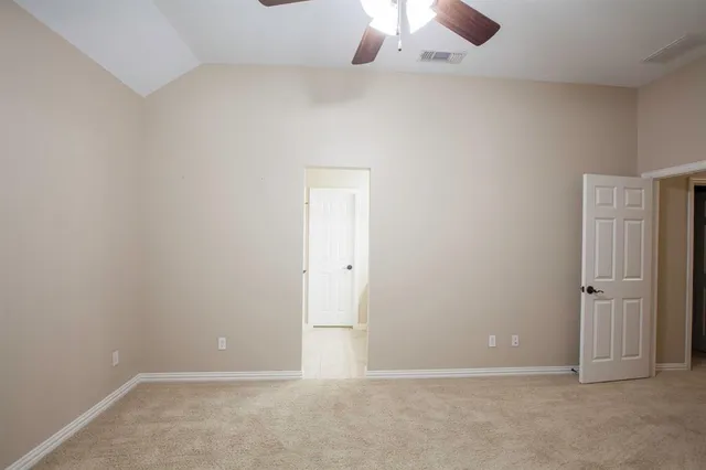 a bathroom with a sink vanity and a mirror