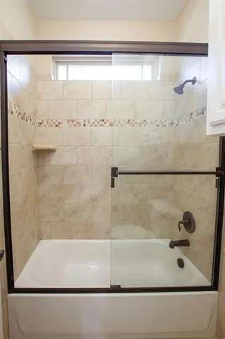 a view of a room with shelf on the wall