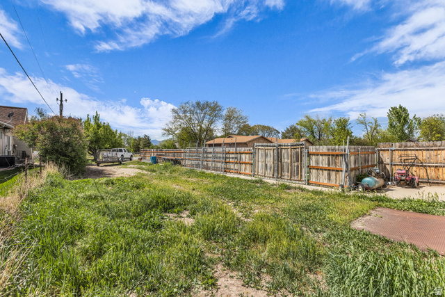 10705 Green Ridge Drive Sandy, UT 84070 - Photo 54 of 55 View of fenced yard