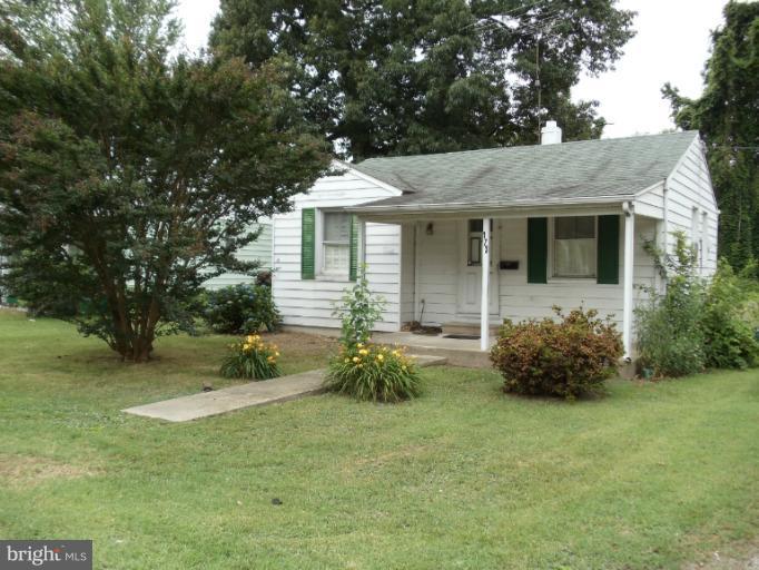 173 Riverside Road Essex, MD 21221 - Photo 1 of 1 a backyard of a house with table and chairs