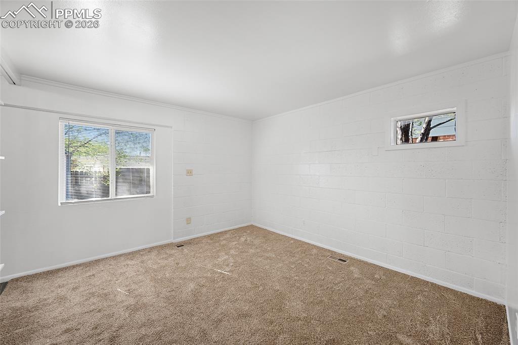 357-359 Fairway South Colorado Springs, CO 80906 - Photo 17 of 20 an empty room with a window