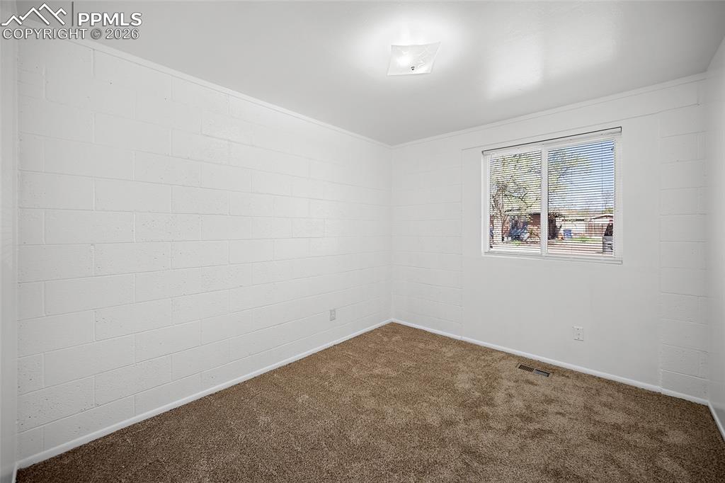 357-359 Fairway South Colorado Springs, CO 80906 - Photo 10 of 20 an empty room with windows