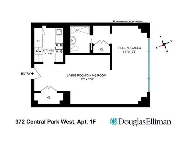 a view of a livingroom with wooden floor and a flat screen tv