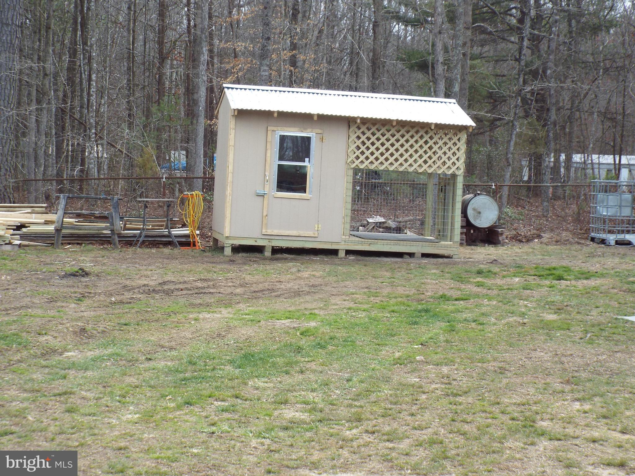 760 Greenes Corner Road Bumpass, VA 23024 - Photo 13 of 14 Dog Kennel.. Lets not even go there.