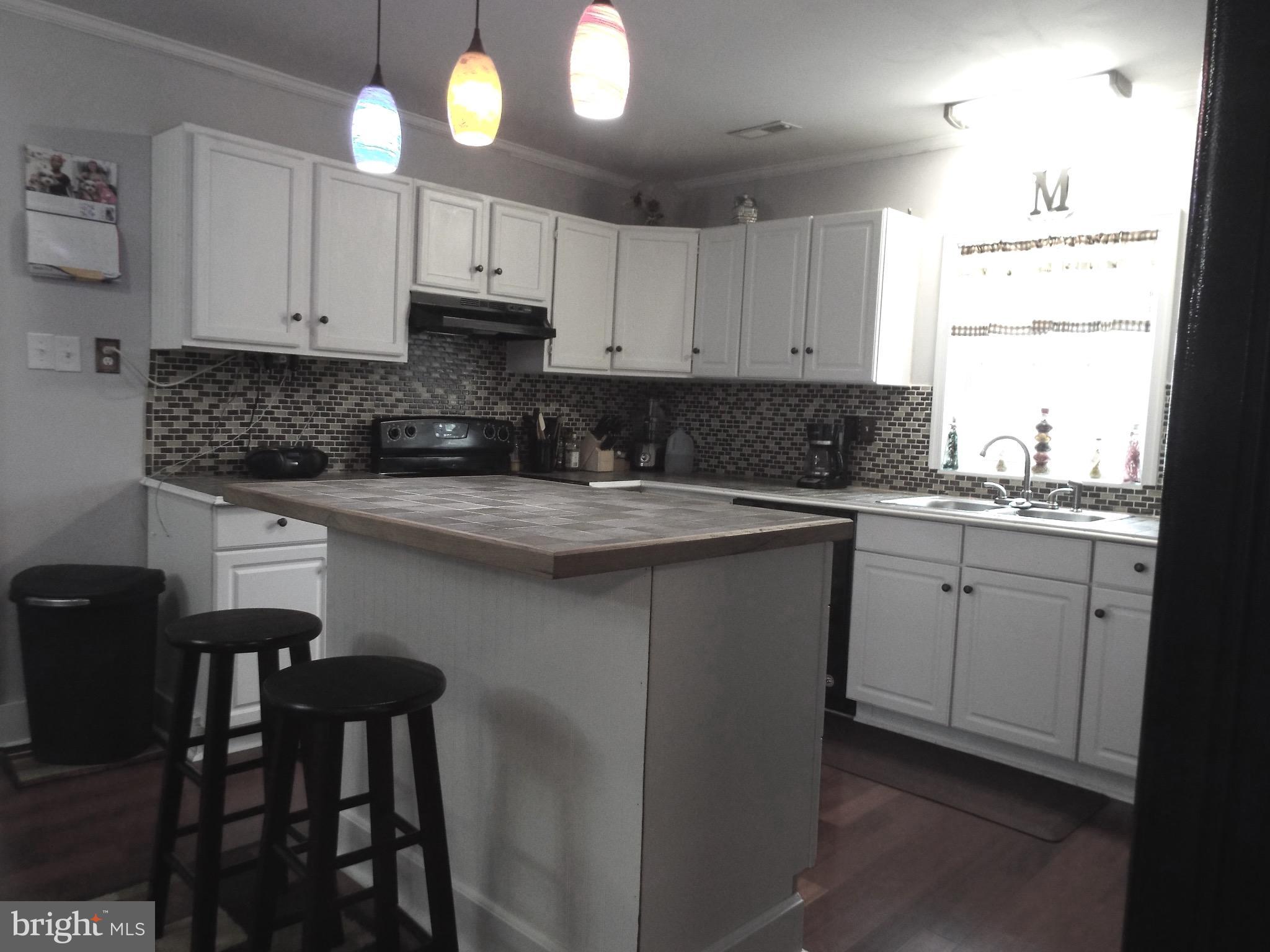 760 Greenes Corner Road Bumpass, VA 23024 - Photo 3 of 14 Coffee, Conversation, Collaboration. Sit and Enjoy