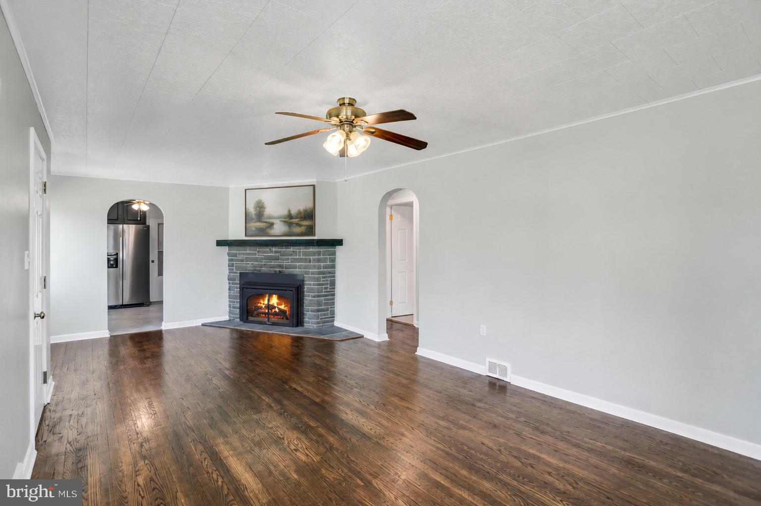 4287 Old Us-322 Reedsville, PA 17084 - Photo 4 of 33 Spacious living area with cozy fireplace.